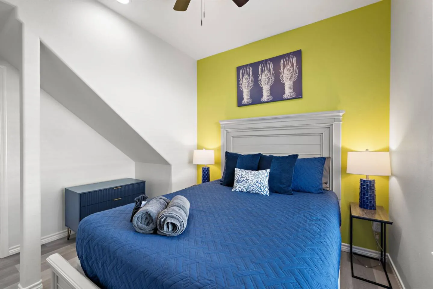 Additional view of a queen bedroom.