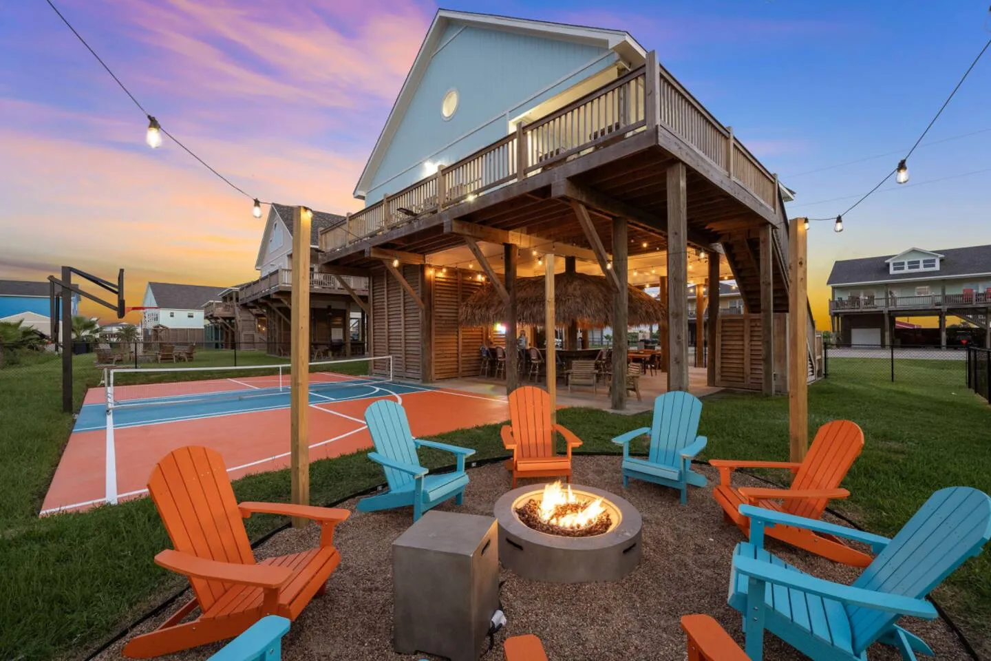 Backyard firepit beside the private court for evening hangouts.