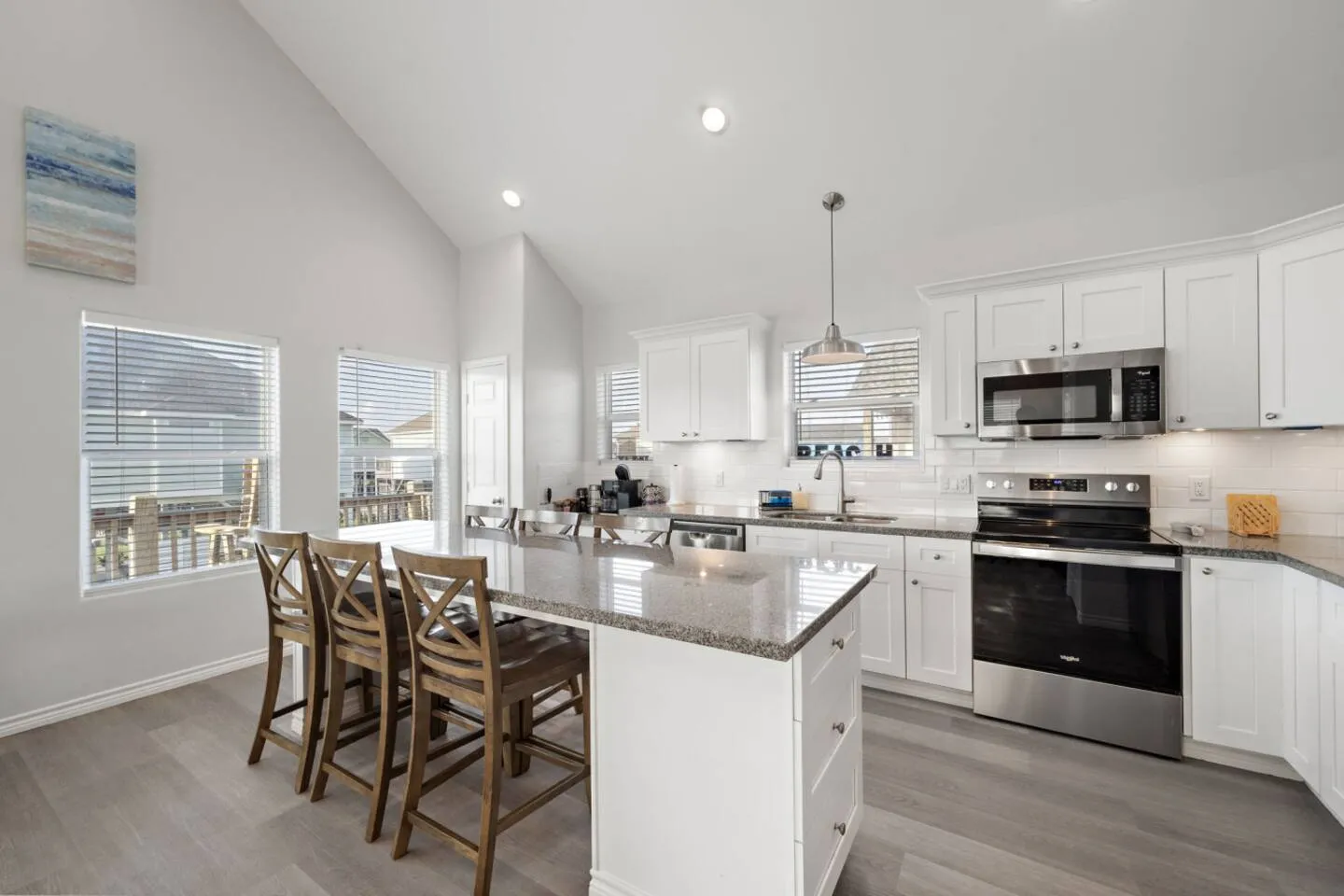 Open layout connecting kitchen, dining, and living space.